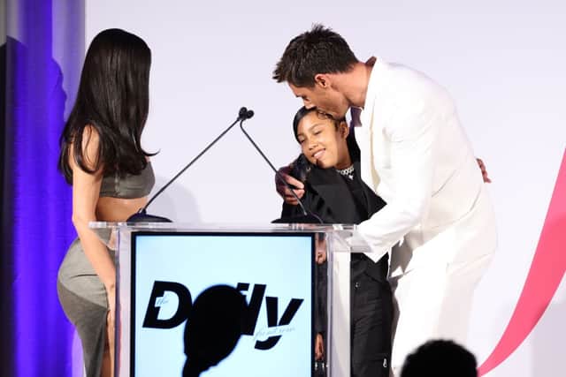 Kim Kardashian and North West present Chris Appleton with an award at the Daily Front Row Fashion Awards in LA (Pic:Getty)