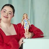 Model Ellie Goldstein posing with Barbie’s first Down’s syndrome doll (Photo: Mattel)