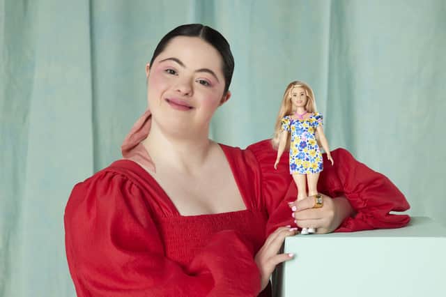 Model Ellie Goldstein posing with Barbie’s first Down’s syndrome doll (Photo: Mattel)
