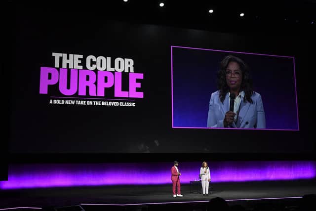Director Blitz Bazawule (L) and producer and host Oprah Winfrey speak during the studio presentation from Warner Bros Pictures during CinemaCon, the official convention of the National Association of Theatre Owners, at The Colosseum at Caesars Palace on April 25, 2023 in Las Vegas, Nevada (Photo by VALERIE MACON / AFP) (Photo by VALERIE MACON/AFP via Getty Images)