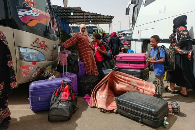 Passengers fleeing war-torn Sudan (Photo: -/AFP via Getty Images)