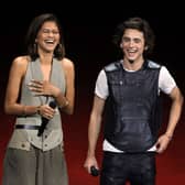 LAS VEGAS, NEVADA - APRIL 25: (L-R) Zendaya and Timothee Chalamet speak on stage as they promote the upcoming film "Dune: Part Two" during the Warner Bros. Pictures Studio presentation during CinemaCon, the official convention of the National Association of Theatre Owners, at The Colosseum at Caesars Palace on April 25, 2023 in Las Vegas, Nevada. (Photo by Ethan Miller/Getty Images)