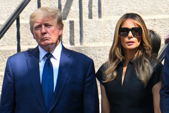 Former President Donald J. Trump and Melania Trump exit the funeral of Ivana Trump at St. Vincent Ferrer Roman Catholic Church July 20, 2022 in New York City. Ivana Trump, the first wife of former U.S. President Donald Trump, died at the age of 73 after a fall down the stairs of her Manhattan home. (Photo by Alexi J. Rosenfeld/Getty Images)