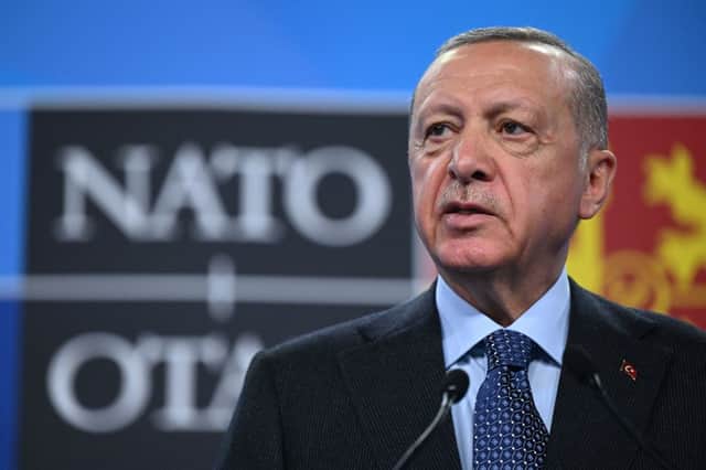 Turkey's President Recep Tayyip Erdogan addresses media representatives during a press conference at the NATO summit at the Ifema congress centre in Madrid, on June 30, 2022. (Photo by GABRIEL BOUYS/AFP via Getty Images)