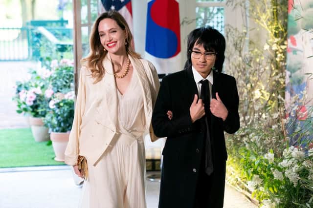 US actress Angelina Jolie and son Maddox arrive for the State Dinner in honor of South Korean President Yoon Suk Yeol, at the White House in Washington, DC, on April 26, 2023. (Photo by Stefani Reynolds / AFP) (Photo by STEFANI REYNOLDS/AFP via Getty Images)
