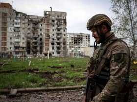A Ukrainian soldier walks through Bakhmut on 23 April (image: AFP/Getty Images)