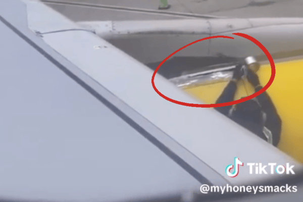 Concerned Spirit Airlines passenger captures moment worker tapes plane wing before take-off 