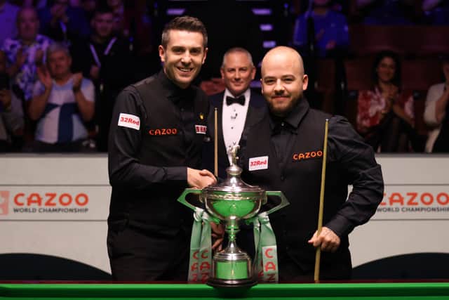 World Championship finalists, Mark Selby and Luca Brecel (R)