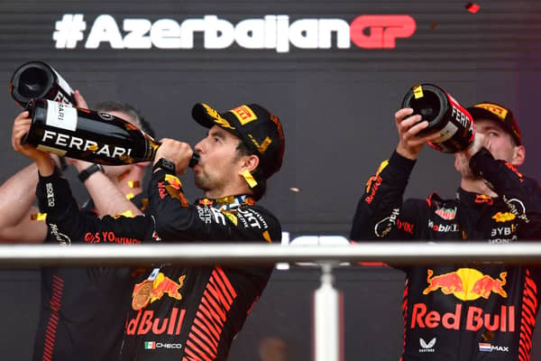 Sergio Perez (L) with Max Verstappen as Red Bull celebrate another 1-2 finish 