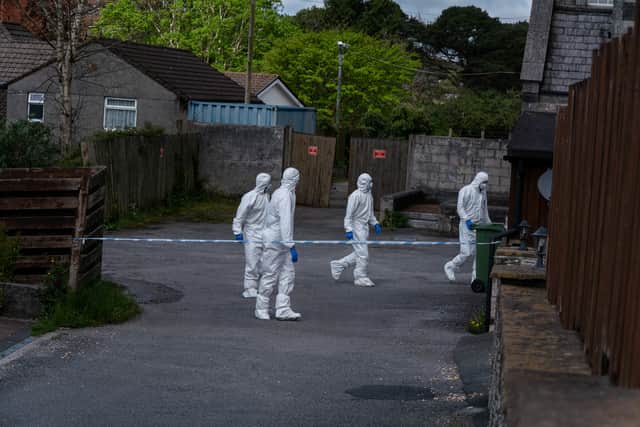 Police forensics continue to search on Castle Canyke, Bodmin. Credit: SWNS