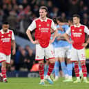 A dejected Rob Holding looks on following Arsenal’s 4-1 loss to Manchester City