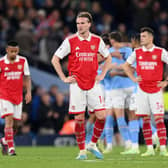 A dejected Rob Holding looks on following Arsenal’s 4-1 loss to Manchester City