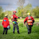 Fire and rescue searching the River Thames, in Lechlade, Gloucestershire. Credit: SWNS