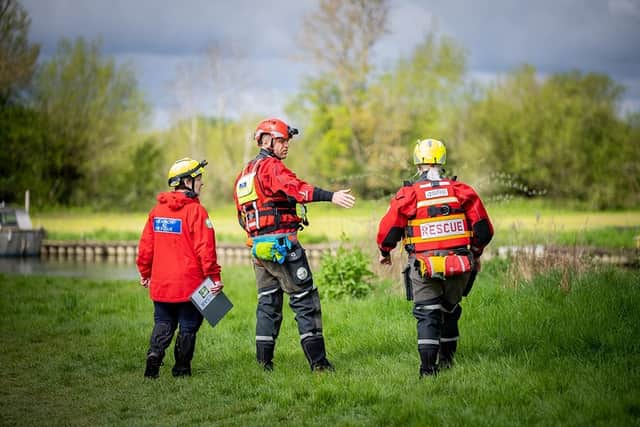 Fire and rescue searching the River Thames, in Lechlade, Gloucestershire. Credit: SWNS