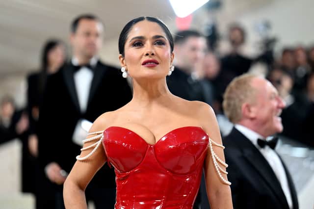Salma Hayek arrives for the 2023 Met Gala at the Metropolitan Museum of Art on May 1, 2023, in New York. - The Gala raises money for the Metropolitan Museum of Art's Costume Institute. The Gala's 2023 theme is "Karl Lagerfeld: A Line of Beauty." (Photo by Angela WEISS / AFP) (Photo by ANGELA WEISS/AFP via Getty Images)