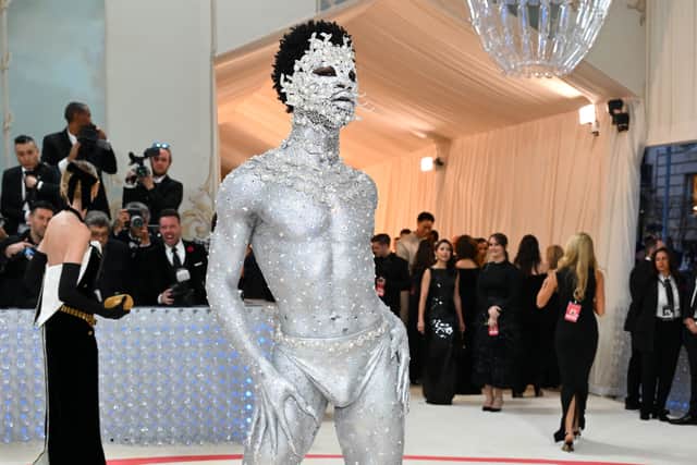 US rapper Lil Nas X arrives for the 2023 Met Gala at the Metropolitan Museum of Art on May 1, 2023, in New York. - The Gala raises money for the Metropolitan Museum of Art's Costume Institute. The Gala's 2023 theme is "Karl Lagerfeld: A Line of Beauty." (Photo by ANGELA WEISS / AFP) (Photo by ANGELA WEISS/AFP via Getty Images)