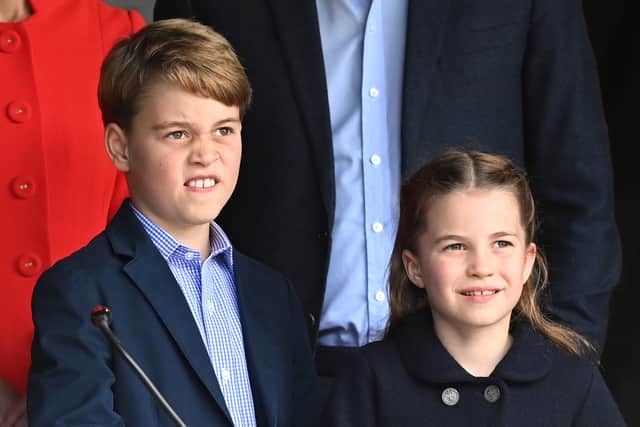 Prince George of Cambridge and Princess Charlotte of Cambridge during a visit to Cardiff Castle on June 04, 2022 in Cardiff, Wales. (Photo by Ashley Crowden - WPA Pool/Getty Images)