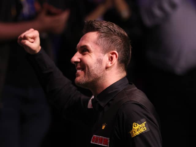 Mark Selby of England celebrates making a maximum 147 break during their Final match against Luca Brecel of Belgium on Day Sixteen of the Cazoo World Snooker Championship 2023 - Credit: Getty