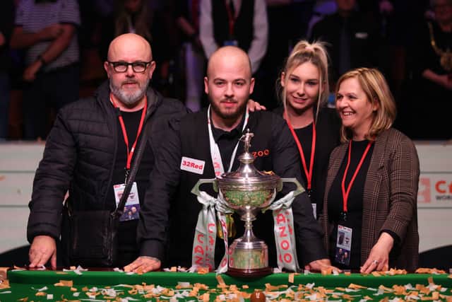 Brecel with his girlfriend, Laura (centre right) and his parents