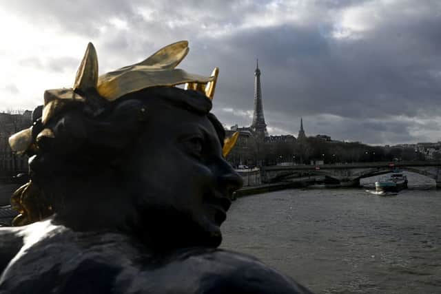 The Seine river is bordered by many of Paris's most iconic buildings (Photo by EMMANUEL DUNAND/AFP via Getty Images)