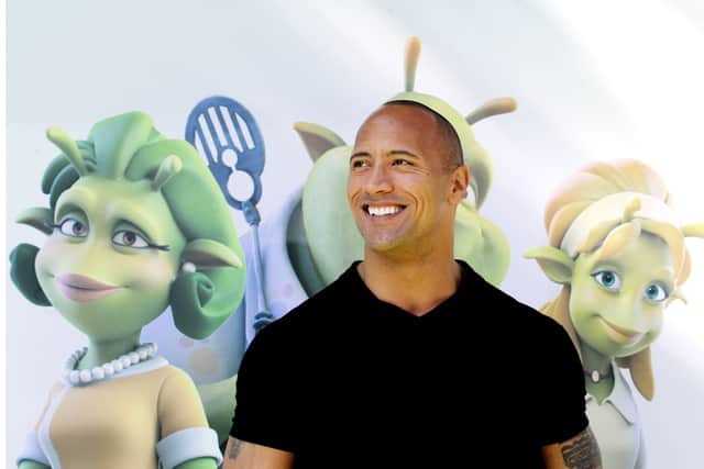 Dwayne Johnson arrives at the premiere of Sony Pictures' "Planet 51" at the Village Theater on November 14, 2009 in Los Angeles, California.  (Photo by Kevin Winter/Getty Images)