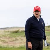 TURNBERRY, SCOTLAND - MAY 02: Former U.S. President Donald Trump reacts during a round of golf at his Turnberry course on May 2, 2023 in Turnberry, Scotland.  Former U.S. President Donald Trump is visiting his golf courses in Scotland and Ireland. Back in the United States, he faces legal action on 34 counts of falsifying business records. (Photo by Robert Perry/Getty Images)