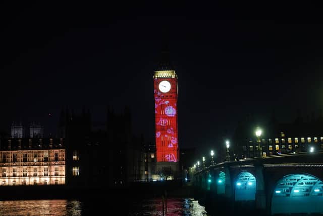 Images are projected onto the Elizabeth Tower in Westminster, central London (Photo: Yui Mok/PA Wire)