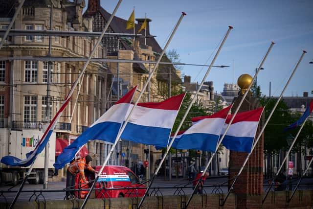 Dutch flags fly at half-mast as a sign of reverence and respect for war victims on the day of National Remembrance Day in The Hague (Photo: PHIL NIJHUIS/ANP/AFP via Getty Images)
