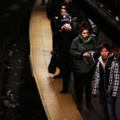 People wait for a subway at a Manhattan station (Photo: Spencer Platt/Getty Images)