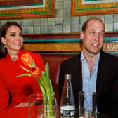LONDON, ENGLAND - MAY 04: Prince William, Prince of Wales and Catherine, Princess of Wales chat to local business people as they visit the Dog and Duck pub in Soho ahead of this weekend's coronation on May 4, 2023 in London, England. (Photo by Jamie Lorriman - WPA Pool/Getty Images)