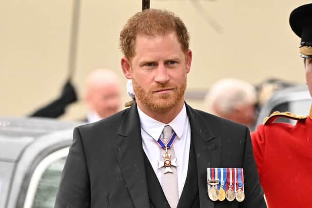 Prince Harry was greeted by boos by crowds in London as he made his way to Westminster Abbey (Photo: Getty Images)