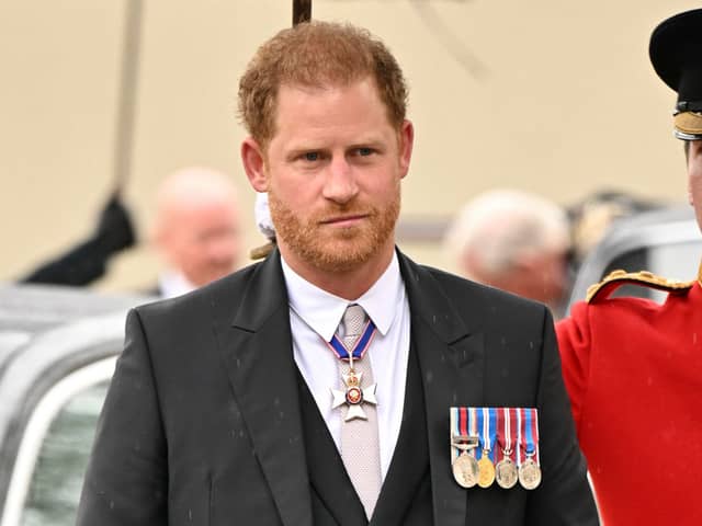 Prince Harry was greeted by boos by crowds in London as he made his way to Westminster Abbey (Photo: Getty Images)