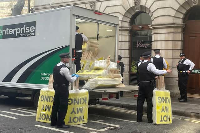 Anti monarchy protest material being confiscated in central London. Picture: Labour for a Republic/PA Wire 