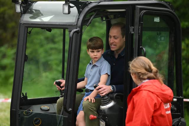 Five-year-old Louis was spotted operating a digger with his father