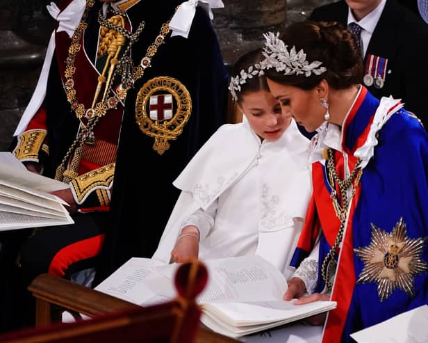 Princess Charlotte and the Catherine, Princess of Wales during the Coronation of King Charles III and Queen Camilla on May 6, 2023 in London, England. The Coronation of Charles III and his wife, Camilla, as King and Queen of the United Kingdom of Great Britain and Northern Ireland, and the other Commonwealth realms takes place at Westminster Abbey today. Charles acceded to the throne on 8 September 2022, upon the death of his mother, Elizabeth II.  (Photo by Yui Mok - WPA Pool/Getty Images)