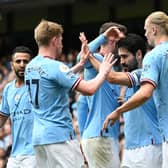 Man City celebrate scoring against Leeds as they hope to achieve treble in 2022/23 season