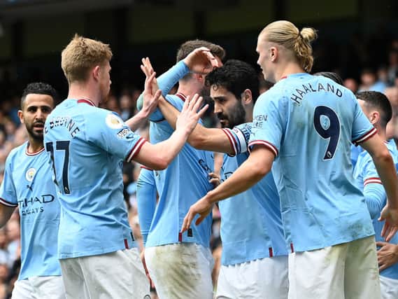 Man City celebrate scoring against Leeds as they hope to achieve treble in 2022/23 season