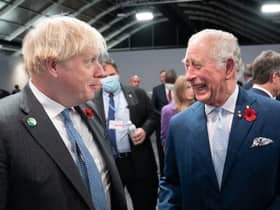 Boris Johnson allegedly "squared up" to King Charles over his reported disapproval over the government's controversial Rwanda policy. (Credit: Getty Images)