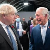 Boris Johnson allegedly "squared up" to King Charles over his reported disapproval over the government's controversial Rwanda policy. (Credit: Getty Images)