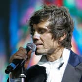 MANCHESTER, UNITED KINGDOM - MAY 04:  Singer Jason Orange of Take That performs onstage as part of the band's Ultimate Tour 2006 at Manchester Arena on May 4, 2006 in Manchester, England. The popular group produced a number of hit singles during the 1990s before Robbie Williams's departure and the band's subsequent split in February 1996.  (Photo by Christopher Furlong/Getty Images)