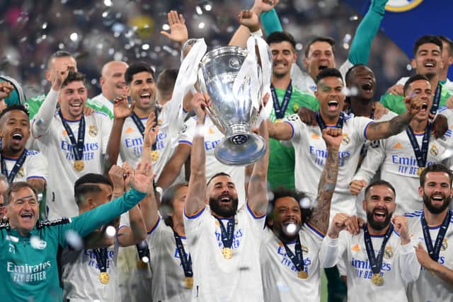 Real Madrid lift the UCL trophy in May 2022 after taking home over €82m