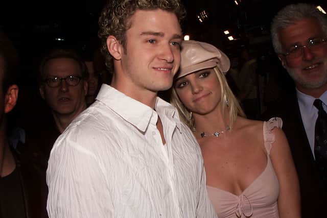 Britney Spears and boyfriend Justin Timberlake arrive at the premiere of her movie "Crossroads" at the Mann Chinese Theatre in Hollywood, Ca., Feb. 11, 2002.  (photo by Kevin Winter/Getty Images)