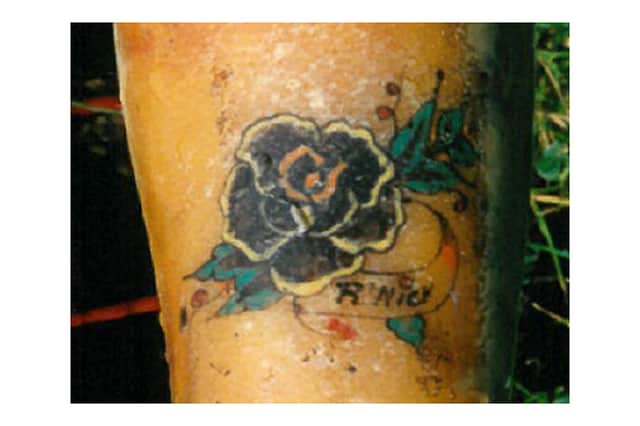 A distinctive flower tattoo, belonging to a woman whose body was discovered in Antwerp, in 1992 (Photo: Interpol)