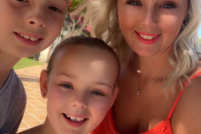 Rachel and her two children, Brayden and Elianna, on holiday in Majorca (Photo: Rachel Smith / SWNS)