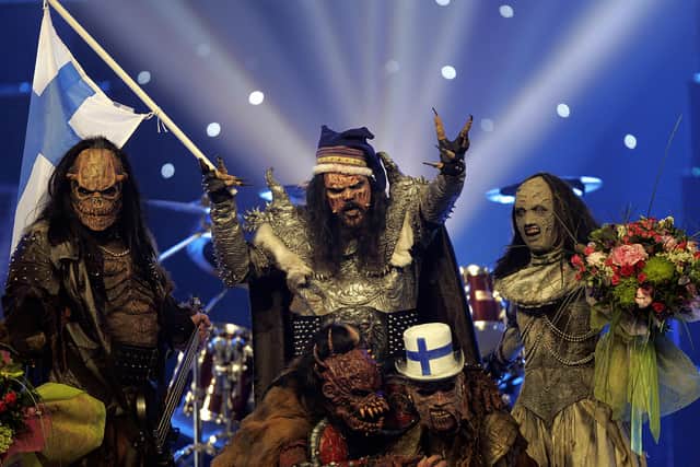 Athens, GREECE:  Finland's Lordi celebrate after winning the 51st Eurovision song contest at the Athens Olympic Indoor Hall, 20 May 2006. Finland won the contest with 292 points, followed by second placed  Russia and third Bosnia and Hercegovina. AFP PHOTO / Aris Messinis  (Photo credit should read ARIS MESSINIS/AFP via Getty Images)