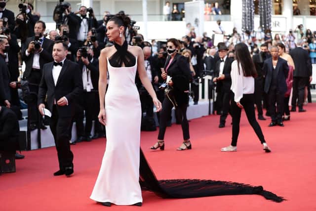 CANNES, FRANCE - JULY 06: Bella Hadid attends the "Annette" screening and opening ceremony during the 74th annual Cannes Film Festival on July 06, 2021 in Cannes, France. (Photo by Vittorio Zunino Celotto/Getty Images for Kering)