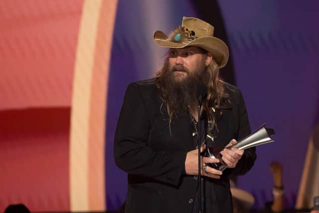 US singer-songwriter Chris Stapleton accepts the Entertainer of the Year Award on stage during the Academy of Country Music (ACM) Awards at Ford Center at the Star in Frisco, Texas - Credit: Getty