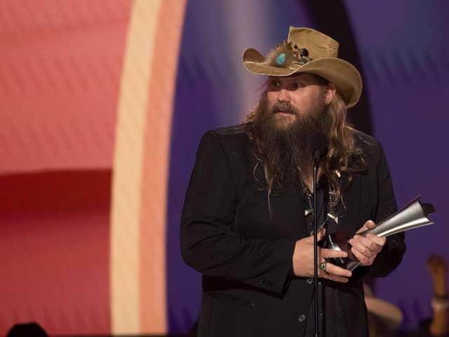 US singer-songwriter Chris Stapleton accepts the Entertainer of the Year Award on stage during the Academy of Country Music (ACM) Awards at Ford Center at the Star in Frisco, Texas - Credit: Getty
