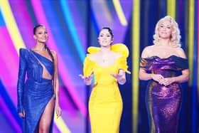 LIVERPOOL, ENGLAND - MAY 13: Eurovision hosts Alesha Dixon, Julia Sanina and Hannah Waddingham on stage during The Eurovision Song Contest 2023 Grand Final at M&S Bank Arena on May 13, 2023 in Liverpool, England. (Photo by Dominic Lipinski/Getty Images)