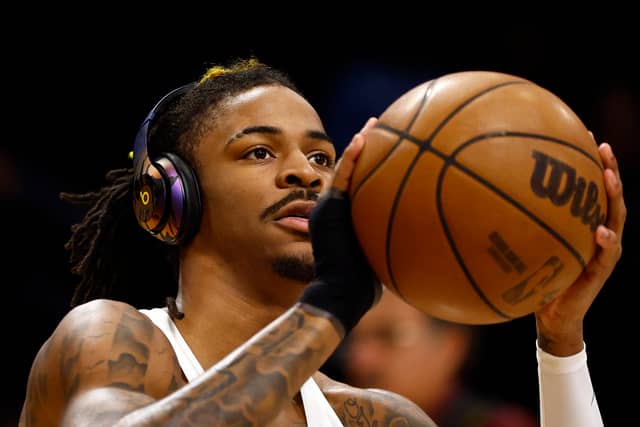 LOS ANGELES, CALIFORNIA - APRIL 28: Ja Morant #12 of the Memphis Grizzlies warms up before play against the Los Angeles Lakers in Game Six of the Western Conference First Round Playoffs at Crypto.com Arena on April 28, 2023 in Los Angeles, California. NOTE TO USER: User expressly acknowledges and agrees that, by downloading and/or using this photograph, user is consenting to the terms and conditions of the Getty Images License Agreement. (Photo by Ronald Martinez/Getty Images)